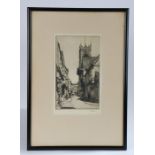 Freda Marston (1895-1949), street scene with church tower, signed etching, housed in a glazed