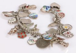 Silver charm bracelet set with thirty-one charms, 55.7g