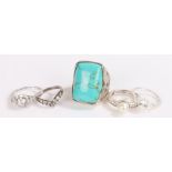 Five silver and coloured paste set rings, various sizes and styles, to include a turquoise