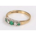 9 carat gold ring set with three emeralds and two diamonds, ring size J1/2, 1.9g