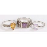 Three silver rings set with purple and yellow stones, 10.4g (3)