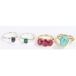 Four silver rings, to include a gilt turquoise set ring, 14.7g (4)