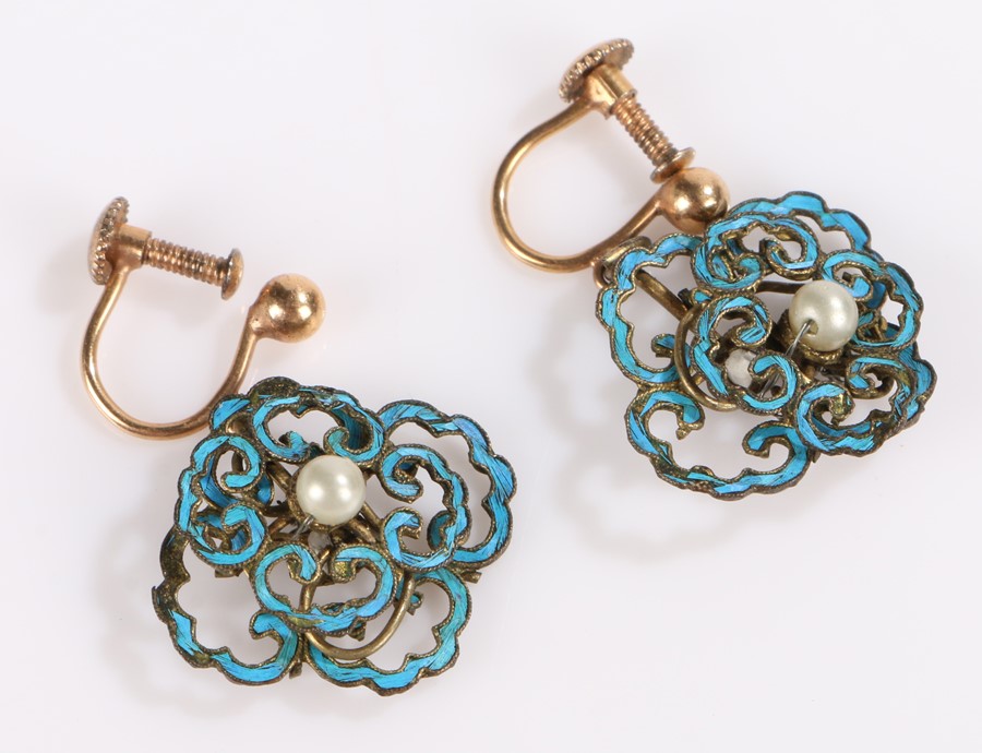 Pair of enamel earrings, the pearl set centres surrounded by pierced turquoise enamel scroll - Image 2 of 2