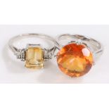Two silver rings set with orange and yellow paste, ring size N, 8.7g (2)