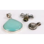 Silver pendants, to include bee, pendant with central clear paste, pendant set with a blue stone,