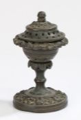 Regency bronze pastille burner, with a domed pierced top above a lappet column and round base,