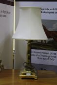 Brass reading lamp with hexagonal shade, on a stepped square base