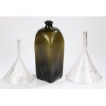 Two Victorian glass funnels with swirled bodies, 29.5cm and 24cm high, large green glass bottle with