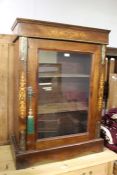 Edwardian mahogany display cabinet, the scroll inlaid pediment above a single glazed door, on a