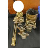 Brass oil lamp, three piece companion set, pair of fire dogs, trivet, blow torches (qty)