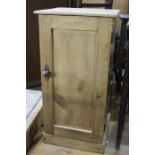 Pine pot cupboard, with panelled door, on a plinth base, 36.5cm wide