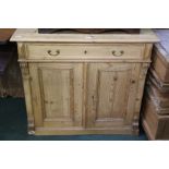 Pine cabinet with frieze drawer above two panelled cupboard doors, 95.5cm wide
