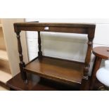 Oak two tier tea trolley, mahogany coffee table with tooled leatherette and glass inset top (2)