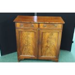 19th Century mahogany cabinet, with a rectangular top above two short drawers and two cupboard