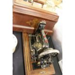 Rex sewing machine, housed in a marquetry inlaid case