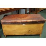 Pine blanket box with tooled leather over-stuffed seat, 99cm wide