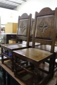 Set of four 17th Century style dining chairs, with diamond carved panel backs, solid seats, on