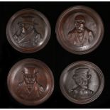 Set of four oak carved panels, each carved with a Dickens figure, Sam Weller, Micawber, Tony
