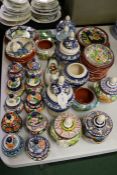 Collection of Spanish and Portuguese terracotta dishes, covered vases, plates etc. (qty)
