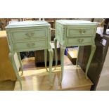 Pair of French style green painted bedside chests, each with two drawers raised on scroll carved