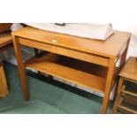 Heals style teak hall table, with two concealed frieze drawers above an open undertier, on square