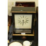 Ansonia American mantel clock, the white dial with Roman numerals, the ebonised case wit an R.A.O.