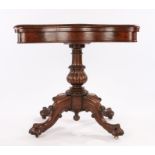Victorian walnut card table the shaped folding top with circular green baize interior, raised on a