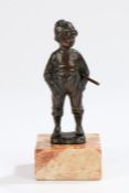 Early 20th Century bronze figure, of a young boy holding a stick, raised on a marble base, 14.5cm