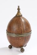 Early 20th Century coconut box, with a finial top and coconut base, 18cm high