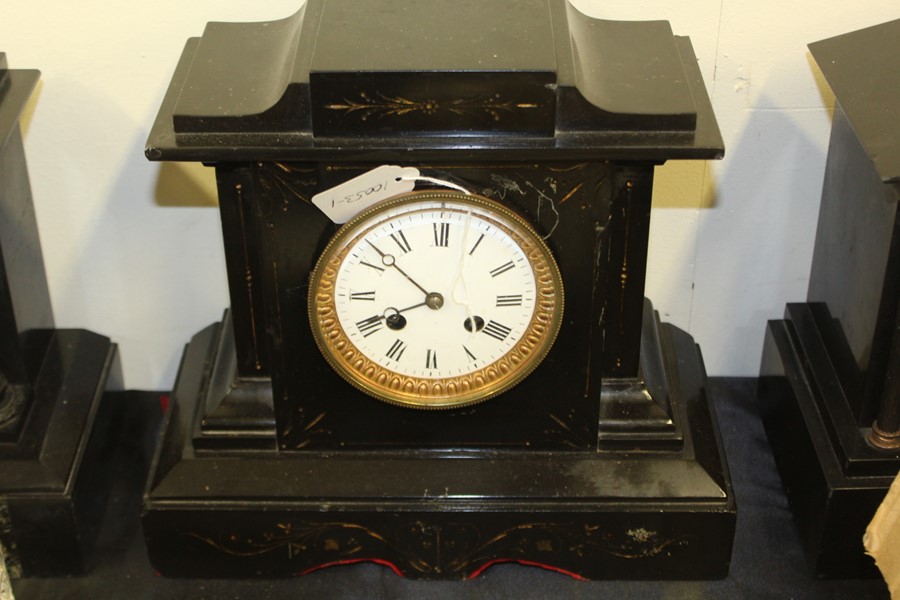 Edwardian black slate mantel clock, with an enamel dial and Roman numerals, architectural design,