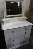 White painted pine dressing table, with bevelled plate above two short and three long drawers