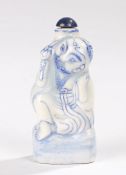 Chinese porcelain snuff bottle, 20th Century, of a figure holding a large gourd to his back with