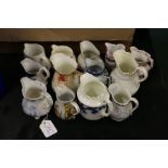 Collection of pottery and porcelain jugs, to include Wedgwood Fallow deer etc. (13)