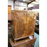 George III style mahogany cabinet, with two frieze drawers above two cupboard doors, 71.5cm wide