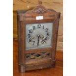 Mid 20th Century oak cased mantel clock, the silvered dial with Arabic numerals, 23cm x 39.5cm
