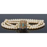 Pearl necklace, the three string necklace with a 9 carat gold clasp set with pearls and turquoise,