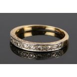 18 carat gold diamond set ring, with a row of cut diamonds to the head, ring size O