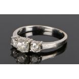 18 carat white gold diamond set ring, the three round cut diamonds at a total of 0.93 carats, ring