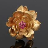 18 carat gold and ruby set brooch, in the form of a flower, 13.7 grams, 36mm diameter