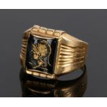 18 carat gold ring, with a classical figure to the head, 5.4 grams, ring size U