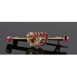 Ruby and diamond set brooch, formed with two interlinked hearts, 38mm diameter