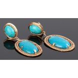 Pair of turquoise set earrings, the cabochon cut stones set to yellow metal. 53mm long