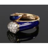 18 carat gold enamel and diamond set ring, in the form of a snake with a diamond encrusted head