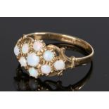 9 carat gold opal set ring, with nine opals to the head, ring size O