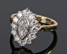 18 carat gold and diamond ring, the central oval diamond surrounded by a band of diamonds, ring size