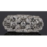 Art Deco diamond set brooch, with round cut and baguette cut diamonds, with an estimated diamond