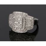 18 carat white gold diamond set ring, the head set with a cluster of diamonds, ring size O