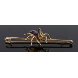 9 carat gold insect brooch, with an amethyst and emerald set spider, the brooch 8cm long