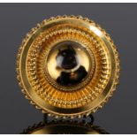 Essex crystal brooch, with a dog to to the centre and a yellow metal surround, 40mm diameter