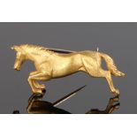 9 carat gold brooch, in the form of a jumping horse, 8.6 grams, 35mm diameter
